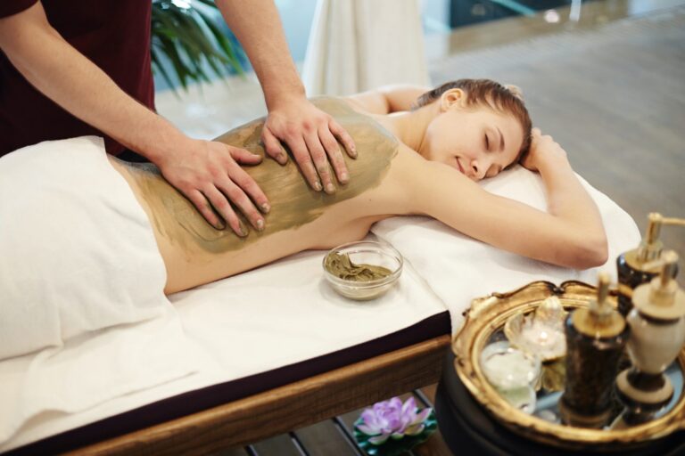woman enjoying mud massage in spa.jpg